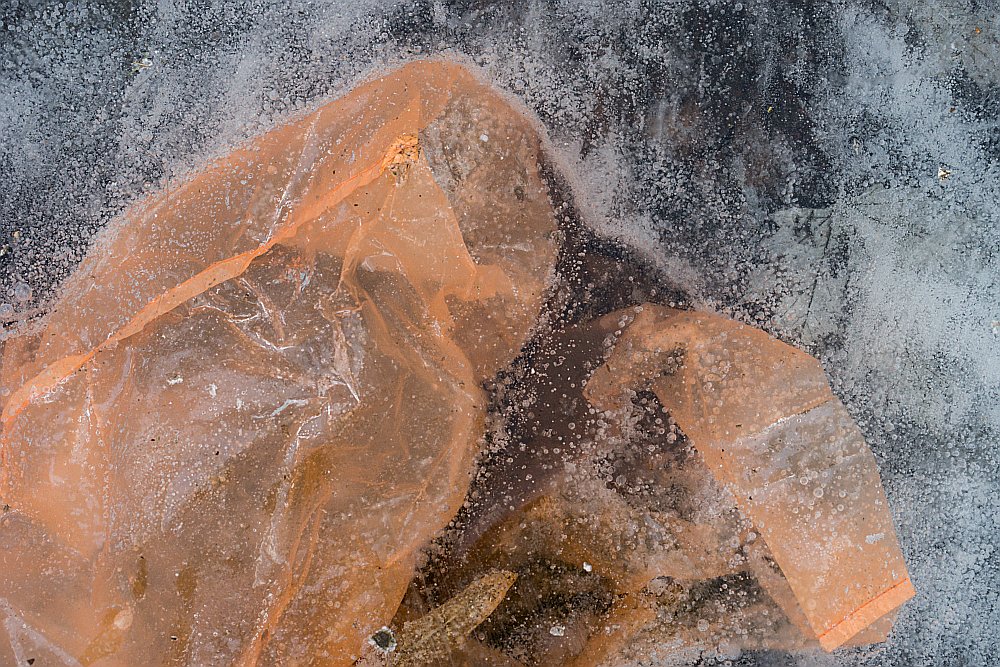 frozen ice orange plastic bag